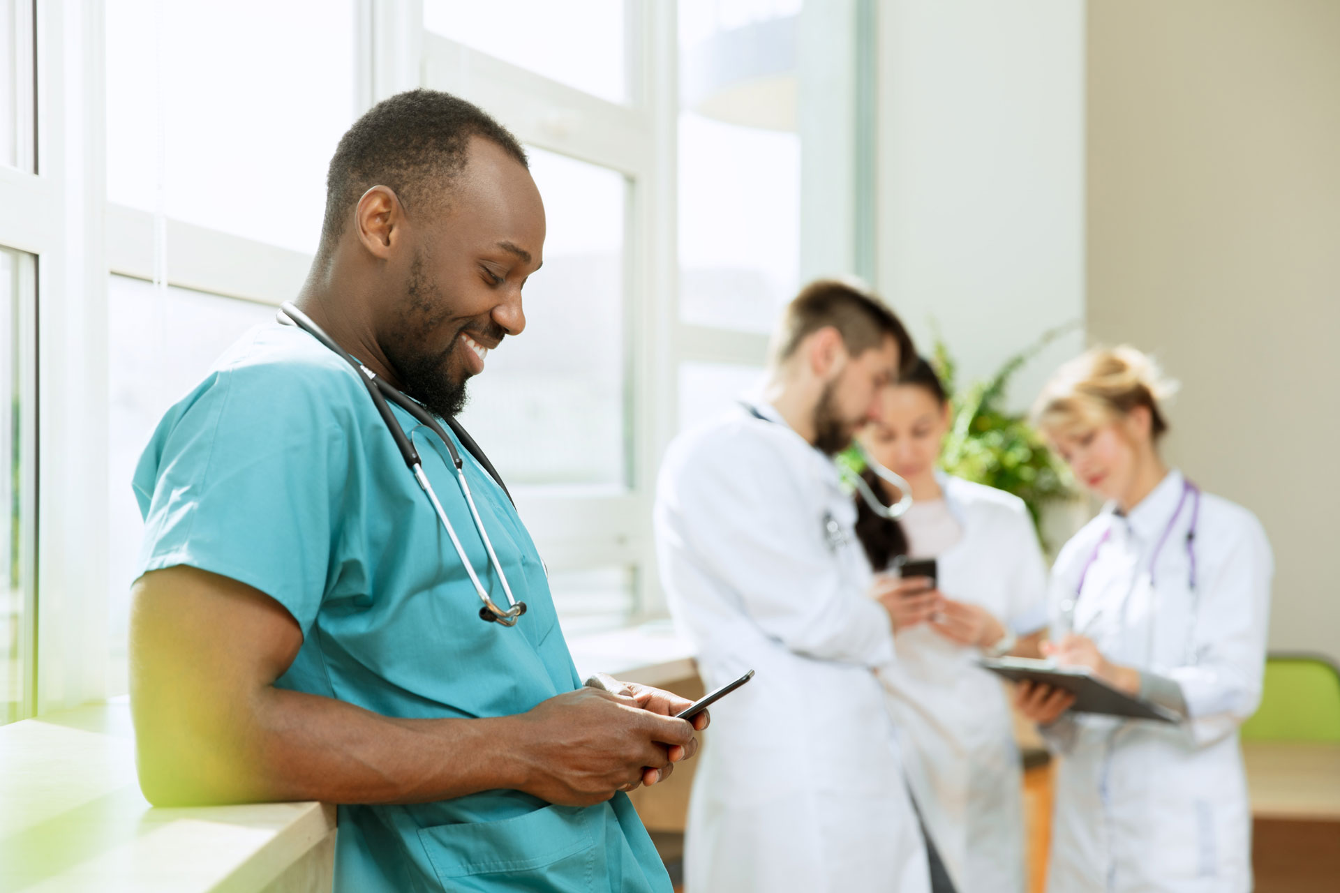 Healthcare worker facing burn out on their mobilre phone